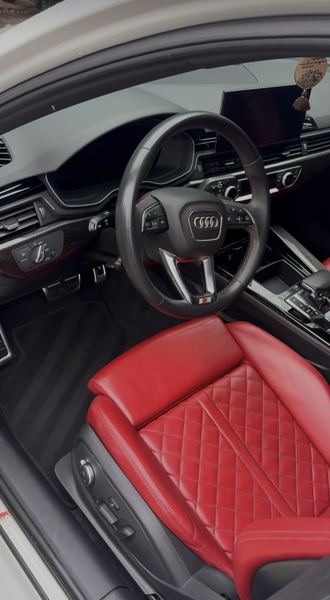 Audi S4 with red diamond-stitched leather, detailed by Austin Auto Detail